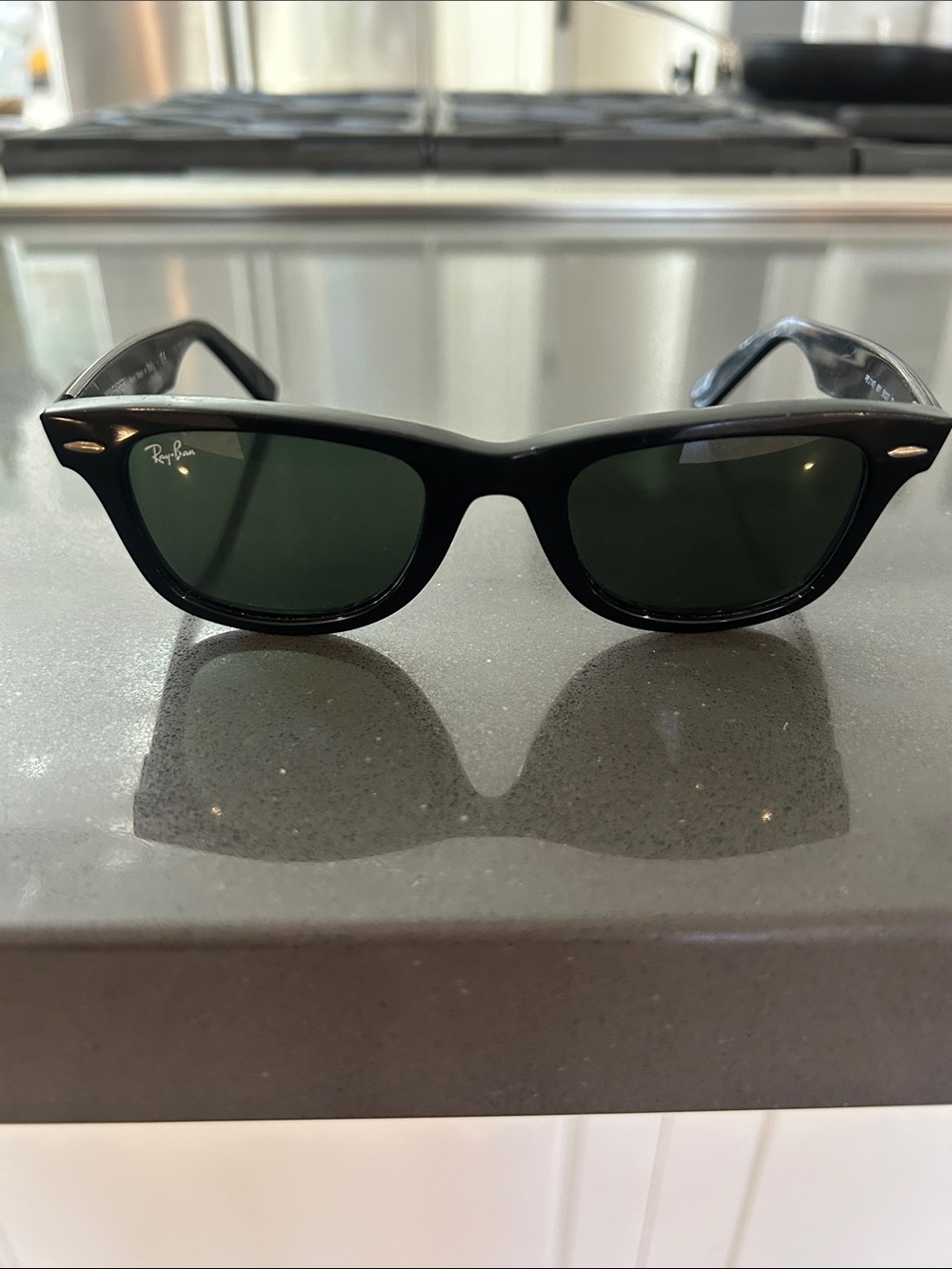 Ray-Ban Black Frame Sunglasses with Dark Green Lenses